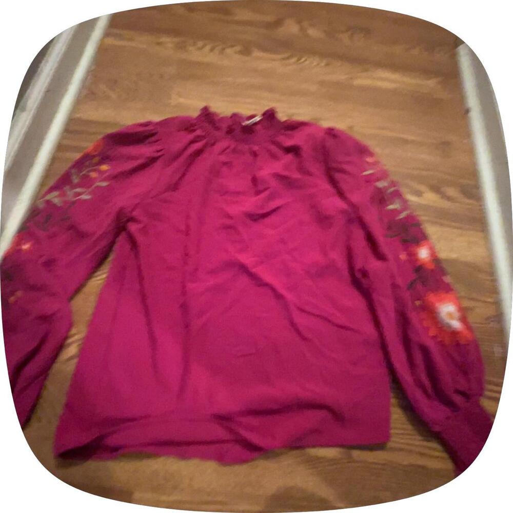 Pink floral long sleeve blouse with orange and white floral embroidery on sleeve